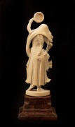 An Indian carved ivory&nbsp;statue of a dancing woman on timber plinth, early to mid 20th century, 18cm high - 2