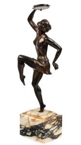 A Continental Art Deco statue of a dancing lady with a tambourine, bronze finish cast metal on a marble base, circa 1935, 47cm high overall