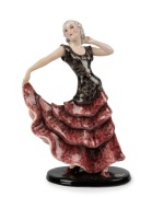 GOLDSCHEIDER&nbsp;Austrian Art Deco porcelain statue of a dancing woman in a burgundy ruffle dress, signed "Lorenzl", black factory mark "Goldscheider, Wien, Made in Austria" with original foil label, 30cm high - 2