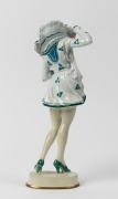 ROSENTHAL German Art Deco porcelain statue of a lady in a green and white dress with ruffle collar, green factory mark to base, 31.5cm high - 2