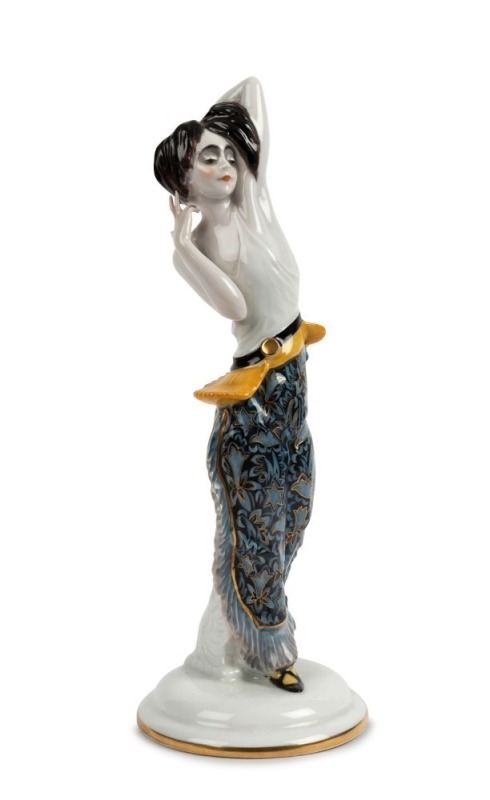 ROSENTHAL German Art Deco porcelain statue of a dancing figure with blue pattern ruffle skirt, signed "C. Holzer-D.", green factory mark to base, 30.5cm high