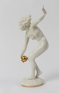 HUTSCHENREUTHER German Art Deco white porcelain statue of a female nude with a gilt orb, signed "K. Tutter", green factory mark to base with original paper label, 25cm high