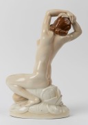 A German Art Deco porcelain statue of a kneeling female nude, signed "D. W. Goebel" 33cm high - 2