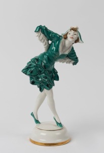 HUTSCHENREUTHER German porcelain statue of a lady in a teal dress with hat, green factory mark to base, 26cm high