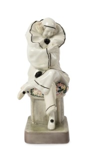 GOLDSCHEIDER Austrian Art Deco porcelain seated Pierrot statue, black factory mark "Goldscheider", 20.5cm high