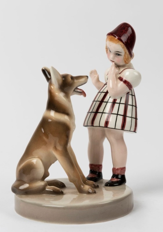 GOLDSCHEIDER Art Deco porcelain figural group of a girl with a dog, black factory mark "Goldscheider, Wien, Made in Germany", 19cm high