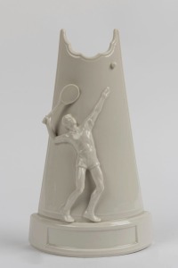 HUTSCHENREUTHER German white porcelain tennis trophy, signed "G. R. Granget", green factory mark to base, 27.5cm high