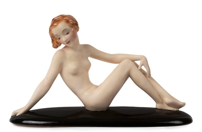 GOLDSCHEIDER Art Deco porcelain statue of reclining female nude, black factory mark "Goldscheider, Wien, Made in Germany", 20cm high, 34cm long