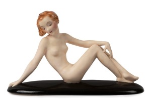GOLDSCHEIDER Art Deco porcelain statue of reclining female nude, black factory mark "Goldscheider, Wien, Made in Germany", 20cm high, 34cm long