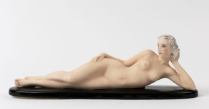 GOLDSCHEIDER Art Deco porcelain statue of lounging female nude, black factory mark "Goldscheider, Wien, Made in Germany", 32.5cm long