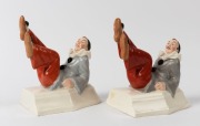 A pair of Continental Art Deco Pierrot porcelain statues, circular factory mark to bases "Made in Czechoslovakia", 19cm high