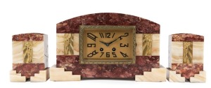 A French Art Deco three piece mantle clock set, eight day time and strike movement in rouge marble and onyx case with gilt metal adornments, circa 1925, the clock 22cm high, 35cm wide