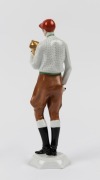 PIRKENHAMMER&nbsp;Czechoslovakian porcelain statue of a jockey with trophy, green factory mark to base, 24.5cm high - 2