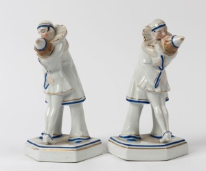 A pair of German porcelain Pierrot figural bookends, stamped "Foreign", 18.5cm high