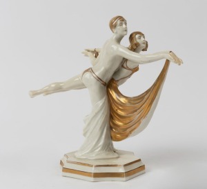 SITZENDORF German porcelain dancing figure group with gilded decoration, green factory mark to base, 19cm high