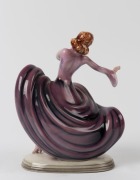 ROYAL BELVEDERE Austrian porcelain statue of a dancing lady in a purple dress, black factory mark to base "Royal Belvedere, Vienna, Made in Austria, Dakon", 17cm high - 2