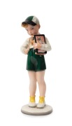 KWK (KERAMOS WIENER KUNSTKERAMIK) Austrian porcelain statue of a schoolboy, triangular factory mark to base "K.W.K. Keramos, Made in Austria,&nbsp;Daycon", 25cm high
