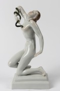 HEREND&nbsp;Hungarian porcelain statue of a female nude with asp, blue factory mark to base, 24.5cm high