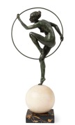 A Continental Art Deco bronze female nude figural lamp with black and white marble shade and base, circa 1920s, 50cm high overall