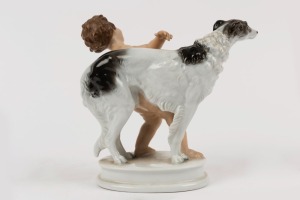 ROSENTHAL German porcelain figural group of a nude boy and dog, factory mark to base, 17cm high