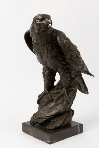 A Bronze eagle statue on black marble base, late 20th century, 50cm high