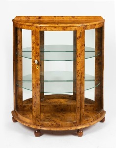 An Art Deco demi lune display cabinet, Karelian birch, mid 20th century, 109cm high, 95cm wide, 41cm deep