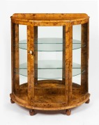 An Art Deco demi lune&nbsp;display cabinet, Karelian&nbsp;birch, mid 20th century, 109cm high, 95cm wide, 41cm deep