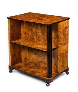 An Austrian Art Deco double sided bookstand, Karelian birch and macassar ebony, circa 1925, 75cm high, 68cm wide, 46cm deep