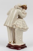 ROYAL DUX Bohemian porcelain figural group with gilded highlights and burgundy base, pink triangle mark to base, 30.5cm high - 2