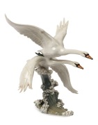 HUTSCHENREUTHER German porcelain flying swans&nbsp;statue, green factory mark to base with original paper label, 31cm high, 25cm wide