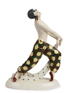 A Czechoslovakian Art Deco porcelain statue of an exotic dancer in gaily coloured pantaloons, circular factory mark to base "Made in Czechoslovakia", 47cm high