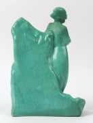 A Belgian green glazed Art Deco sculpture of a skier, incised "Made in Belgium", 32cm high - 2