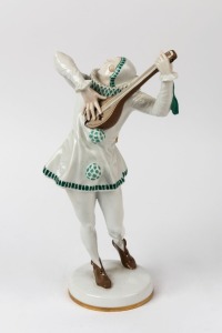 HUTSCHENREUTHER German Art Deco porcelain statue of a lute player, green factory mark to base, signed "K. Tutter", 36cm high