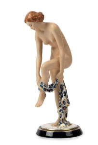ROYAL DUX Czechoslovakian porcelain statue of a female nude with drapery, pink triangle mark to base, 21.5cm high