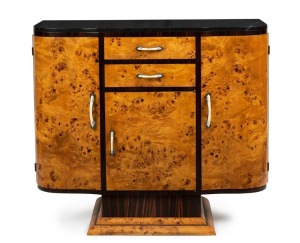 An Austrian Art Deco sideboard, Karelian birch and macassar ebony with black marble top and ivorine handles, circa 1925, 93cm high, 107cm wide, 37cm deep