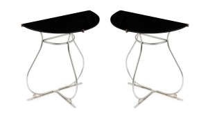 A pair of Art Deco style demi lune side tables, chrome with black glass tops, mid 20th century, ​​​​​​​61cm high, 60cm wide, 30cm deep