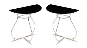 A pair of Art Deco style demi lune side tables, chrome with black glass tops, mid 20th century, 61cm high, 60cm wide, 30cm deep