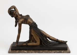 (After) DIMITRI CHIPARUS reclining exotic dancer, cast in bronze on marble plinth, 43cm high, 62cm wide