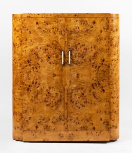 An Art Deco two door gentleman''s wardrobe, Karelian birch with ivorine handles, mid 20th century, has been converted to a bedroom entertainment cabinet (back removed), 138cm high, 118cm wide, 55cm deep