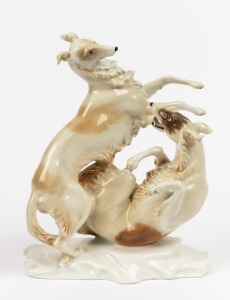 HUTSCHENREUTHER German porcelain statue of two hounds, green factory mark to base, 29cm high