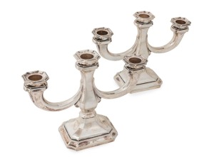 A pair of Continental silver three branch candelabra, stamped "835", 18.5cm high, 24.5cm wide, 756 grams total