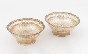 A pair of English sterling silver bon bon dishes with pierced rims by Mappin & Webb of Birmingham, circa 1928, 5cm high, 11.5cm diameter, 176 grams total