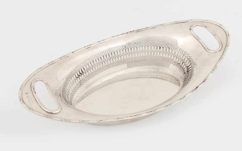 An English sterling silver breadbasket, early 20th century, (marks rubbed), 33.5cm wide, 302 grams