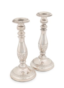 A pair of silver candlesticks, 20th century, weighted bases, no visible marks, 22.5cm high
