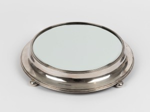 An antique silver plated table centre piece stand with mirrored top, late 19th century, 37cm diameter