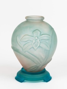 An opalescent blue glass vase with orchard motif on blue glass stand, circa 1935, 29cm high overall