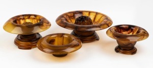 Four assorted Art Deco tartaruga and amber glass float bowls (three with stands, two with flower aids), A/F, circa 1930, the largest 39cm diameter