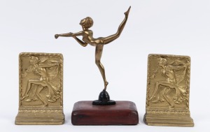 A pair of painted metal bookends together with an Art Deco brass statue of a lady, (3 items), the statue 24cm high overall