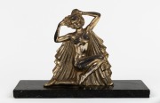 An Art Deco cast metal statue of a kneeling woman with silvered finish on marble base, signed "Molin", circa 1935, 20cm high, 30cm wide