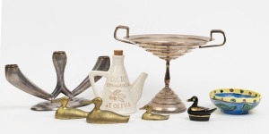 Four assorted duck ornaments, pottery bowl and oil bottle, silver plated compote, and a three branch candelabra, (8 items), ​​​​​​​the candelabra 15cm high, 29cm wide